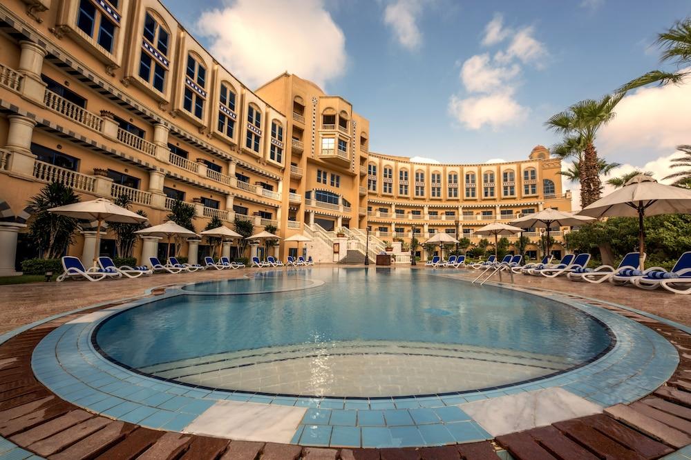 梦境赫尔南国际酒店 6th of October City 外观 照片 The pool at the Grand Hotel